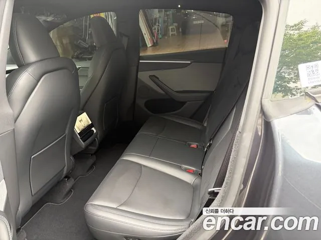 Tesla Model Y — фото 15