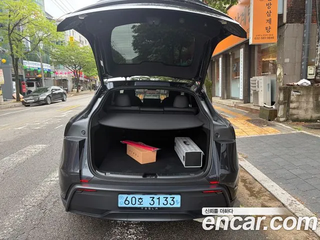 Tesla Model Y — фото 19