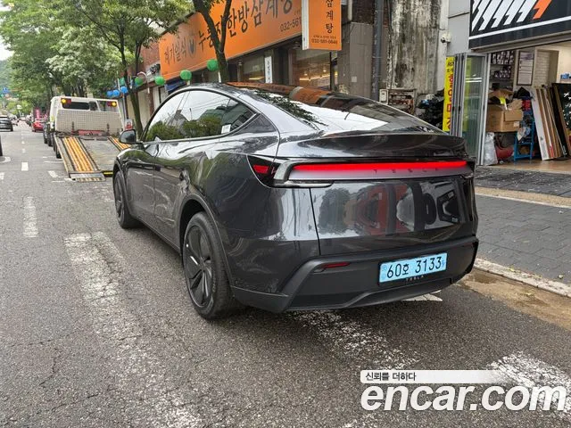 Tesla Model Y — фото 7