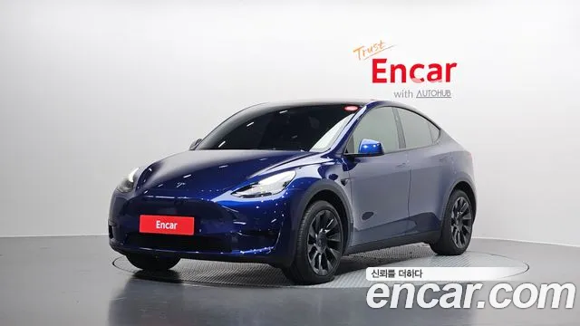Tesla Model Y — фото 1
