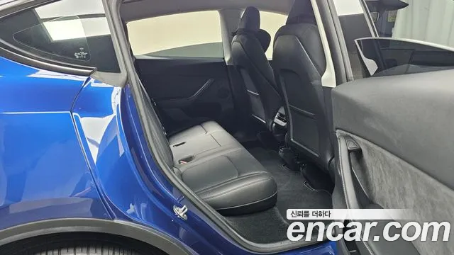 Tesla Model Y — фото 11