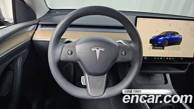 Tesla Model Y — фото 12