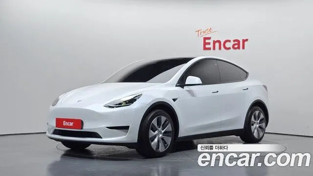 Tesla Model Y — фото 1