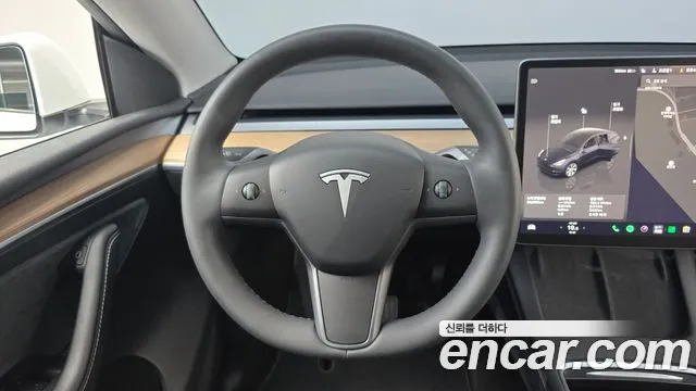 Tesla Model Y — фото 13