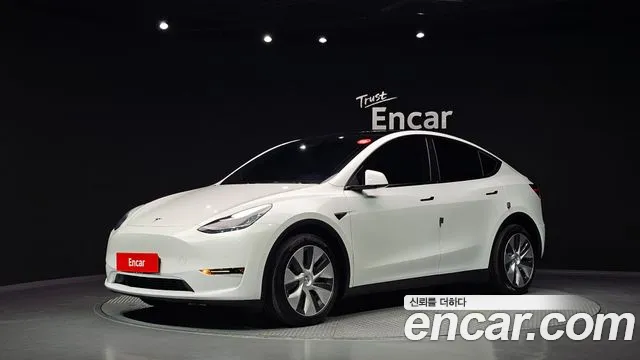 Tesla Model Y — фото 1