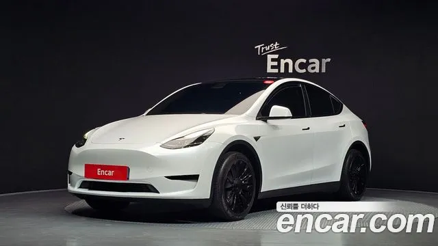 Tesla Model Y — фото 1