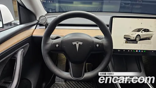 Tesla Model Y — фото 13