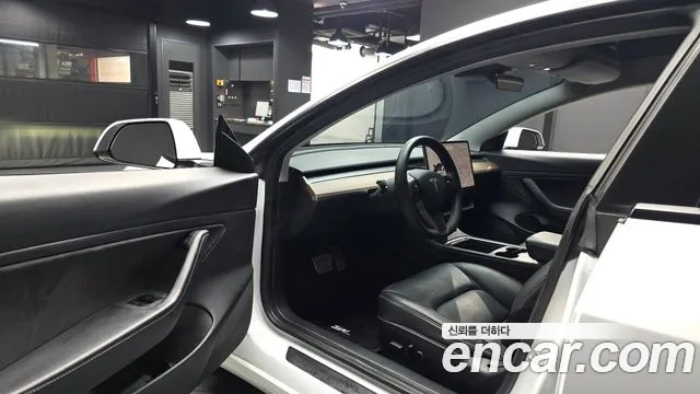Tesla Model 3 — фото 10