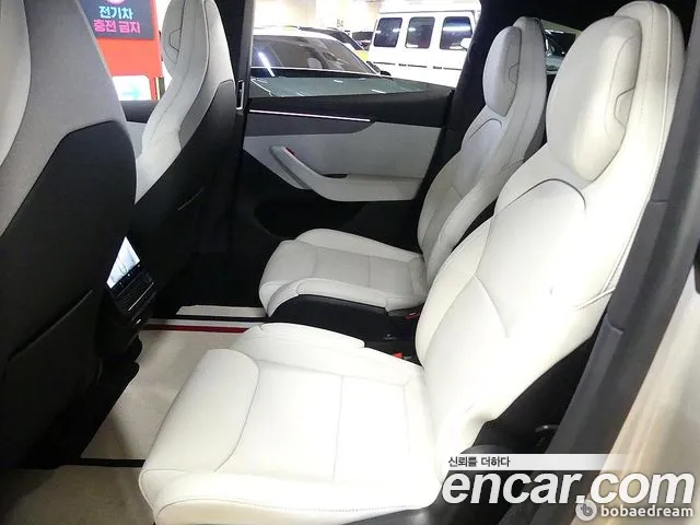 Tesla Model Y — фото 20