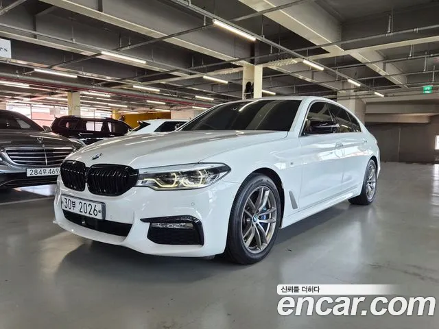 BMW 5-Series — фото 1