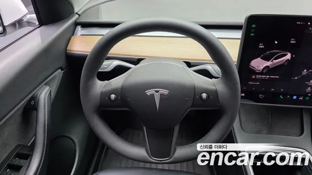 Tesla Model Y — фото 13