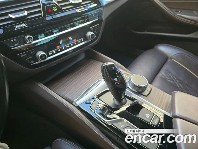 BMW 5-Series — фото 13
