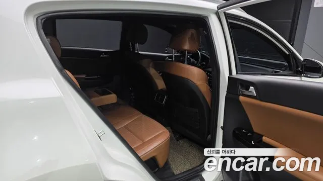 Kia Sportage — фото 11