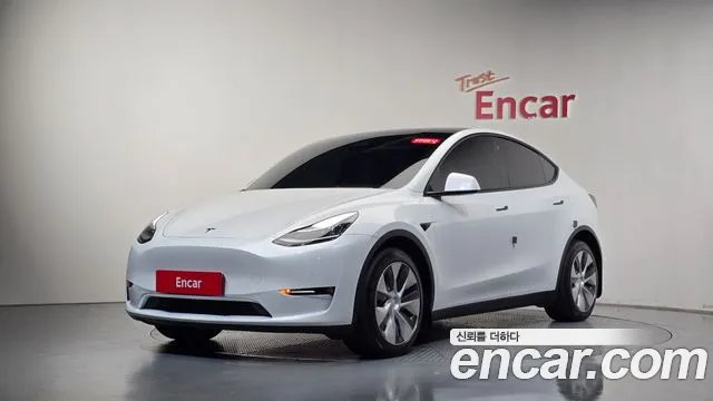 Tesla Model Y — фото 1