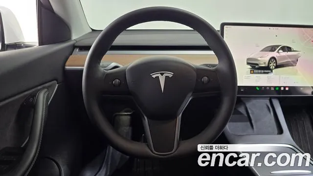 Tesla Model Y — фото 14