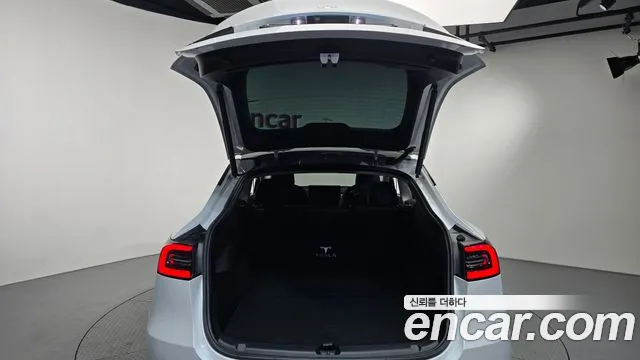 Tesla Model Y — фото 19