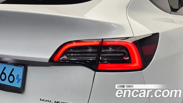 Tesla Model Y — фото 24
