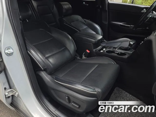 Kia Sportage — фото 11