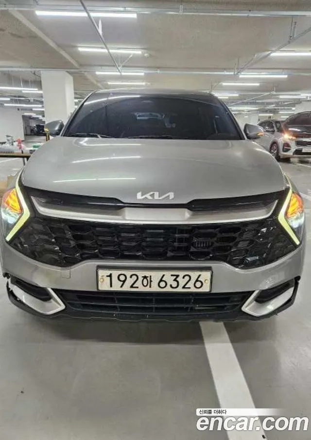 Kia Sportage — фото 1