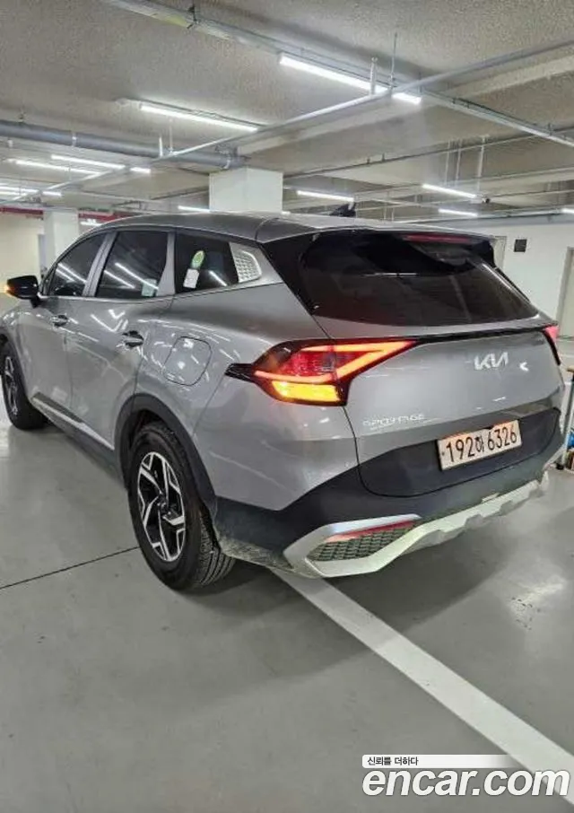 Kia Sportage — фото 8