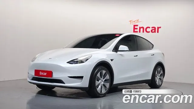 Tesla Model Y — фото 1