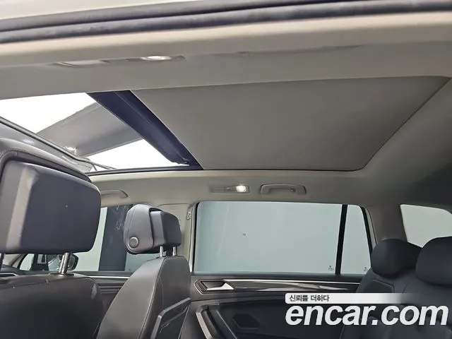 Volkswagen Tiguan — фото 13