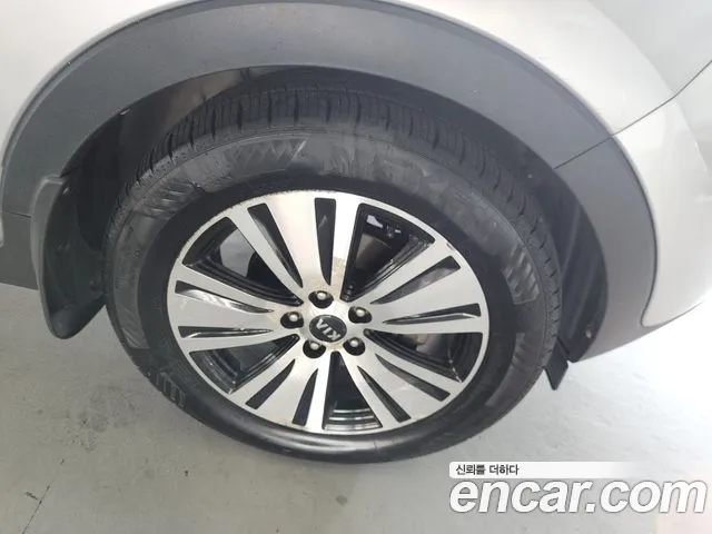 Kia Sportage — фото 11