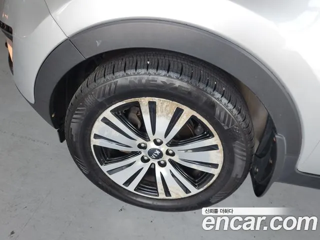 Kia Sportage — фото 12