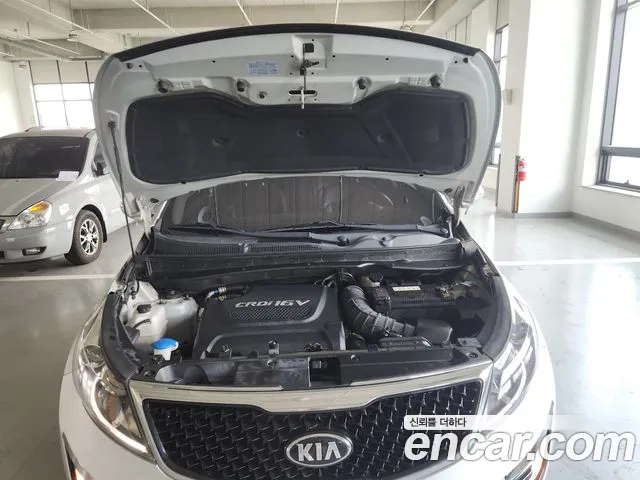 Kia Sportage — фото 13