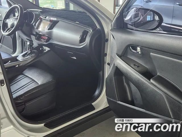 Kia Sportage — фото 15