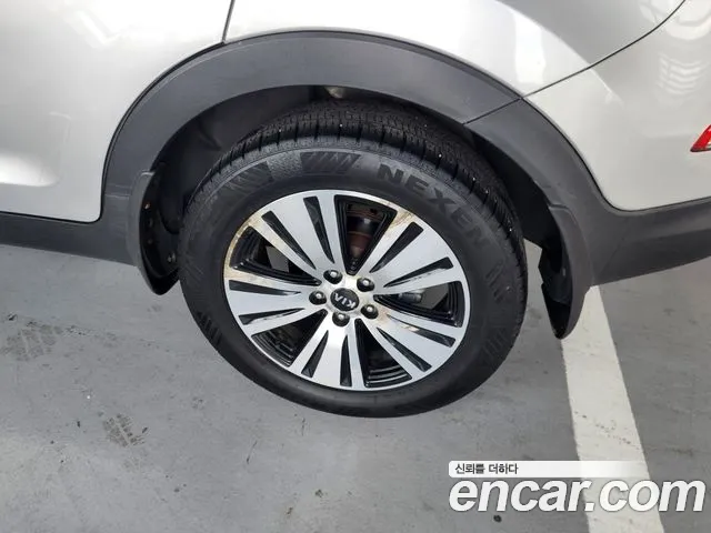 Kia Sportage — фото 10