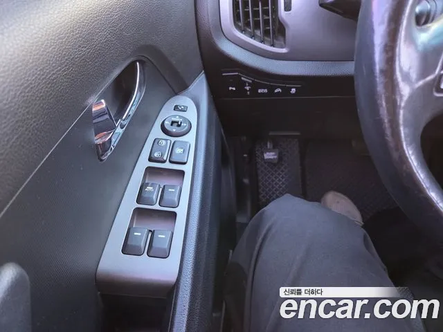 Kia Sportage — фото 12