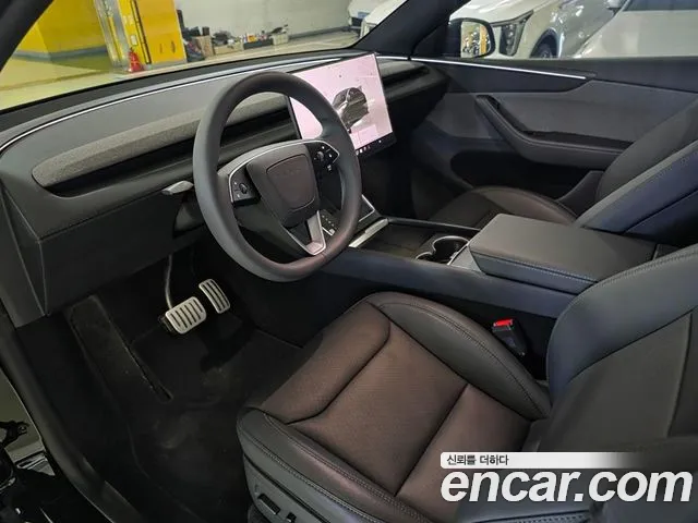 Tesla Model Y — фото 11