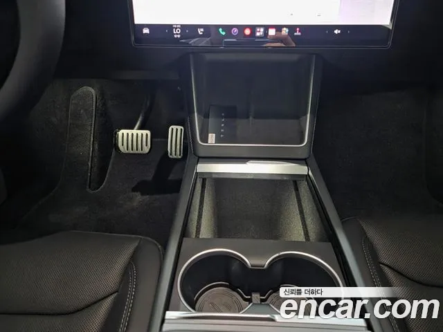 Tesla Model Y — фото 13