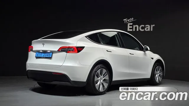 Tesla Model Y — фото 2