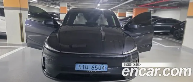 Tesla Model Y — фото 1