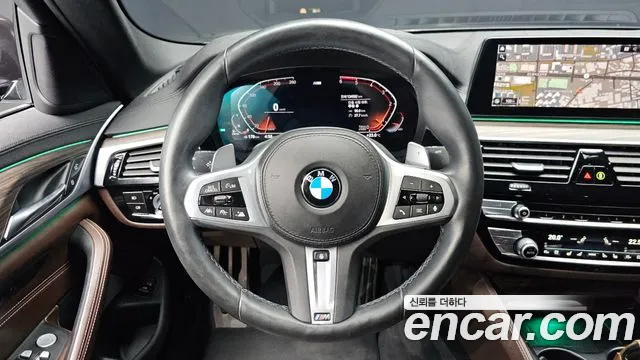 BMW 5-Series — фото 12