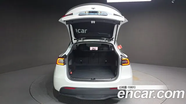 Tesla Model Y — фото 19