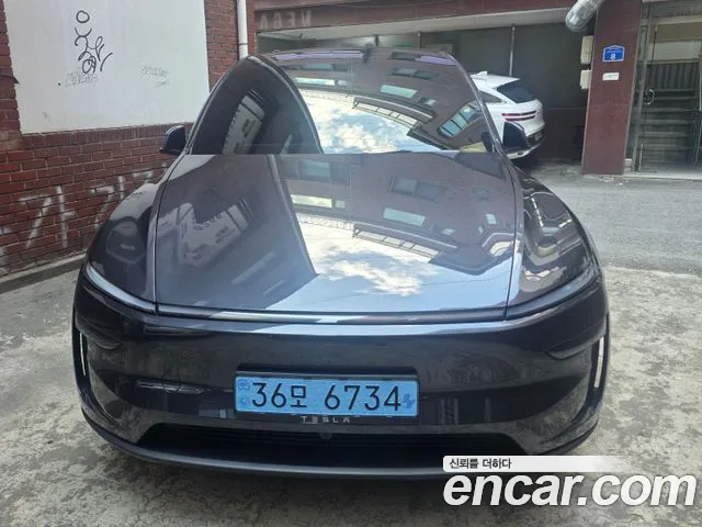 Tesla Model Y — фото 1