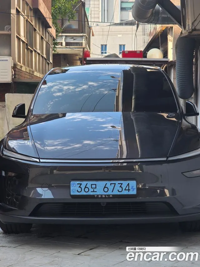 Tesla Model Y — фото 6