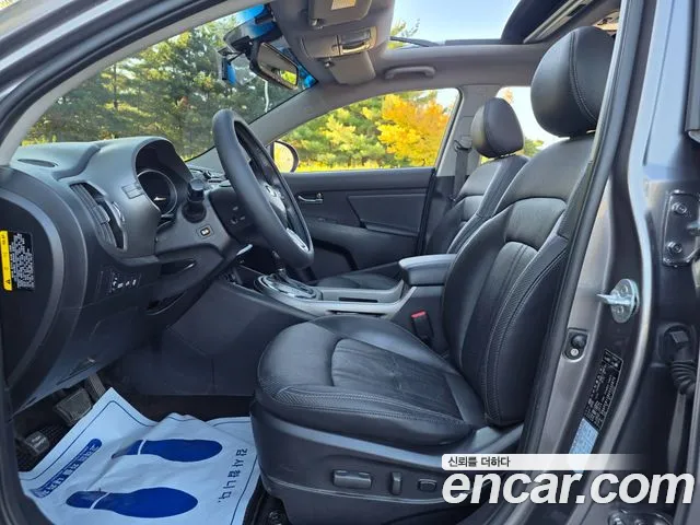 Kia Sportage — фото 14