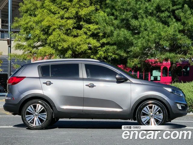 Kia Sportage — фото 7
