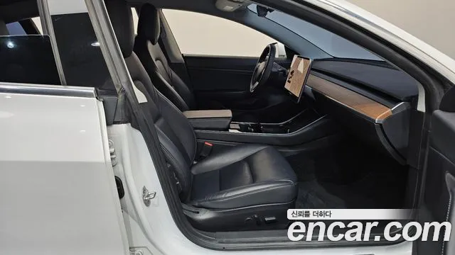 Tesla Model 3 — фото 11