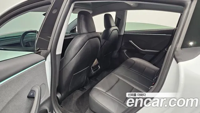 Tesla Model 3 — фото 11