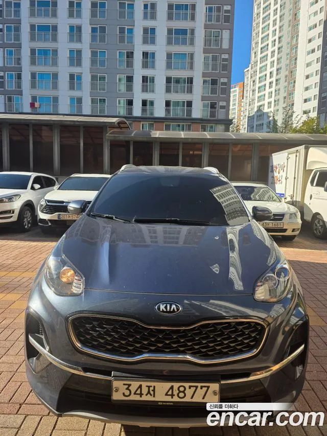 Kia Sportage — фото 1