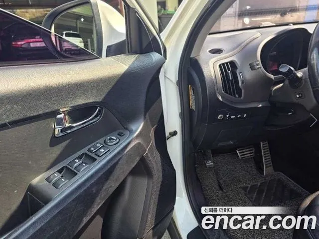 Kia Sportage — фото 11
