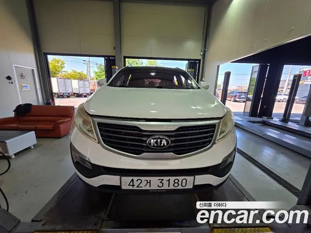 Kia Sportage — фото 13