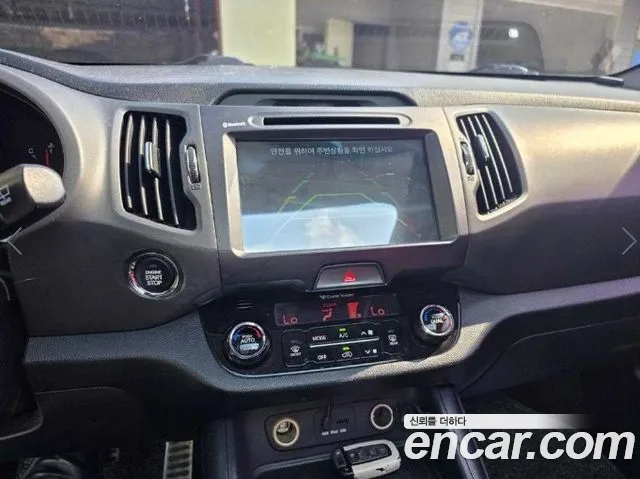 Kia Sportage — фото 7
