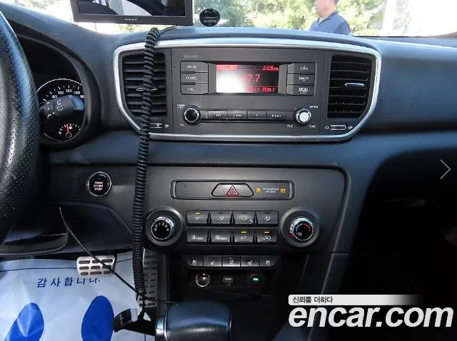 Kia Sportage — фото 13