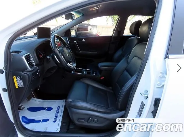 Kia Sportage — фото 5